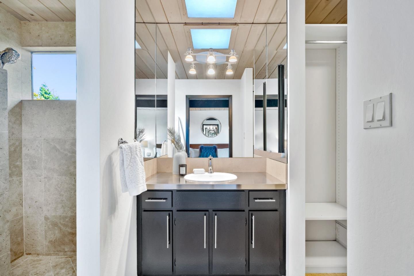 958 Eichler Drive Mountain View, CA 94040 - Photo 46 of 62 a bathroom with a sink vanity and a mirror