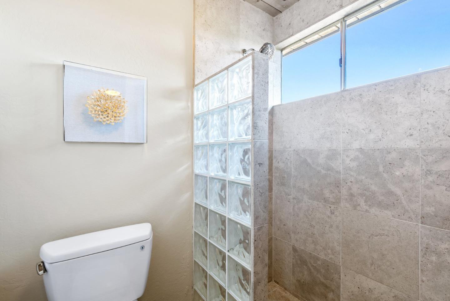 958 Eichler Drive Mountain View, CA 94040 - Photo 47 of 62 a bathroom with a toilet and a shower