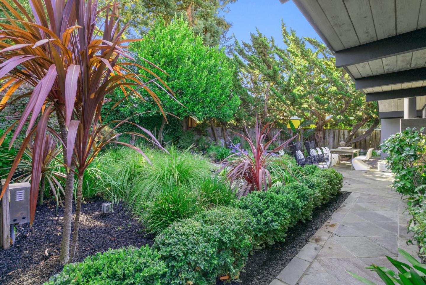 958 Eichler Drive Mountain View, CA 94040 - Photo 53 of 62 a backyard of a house with lots of green space