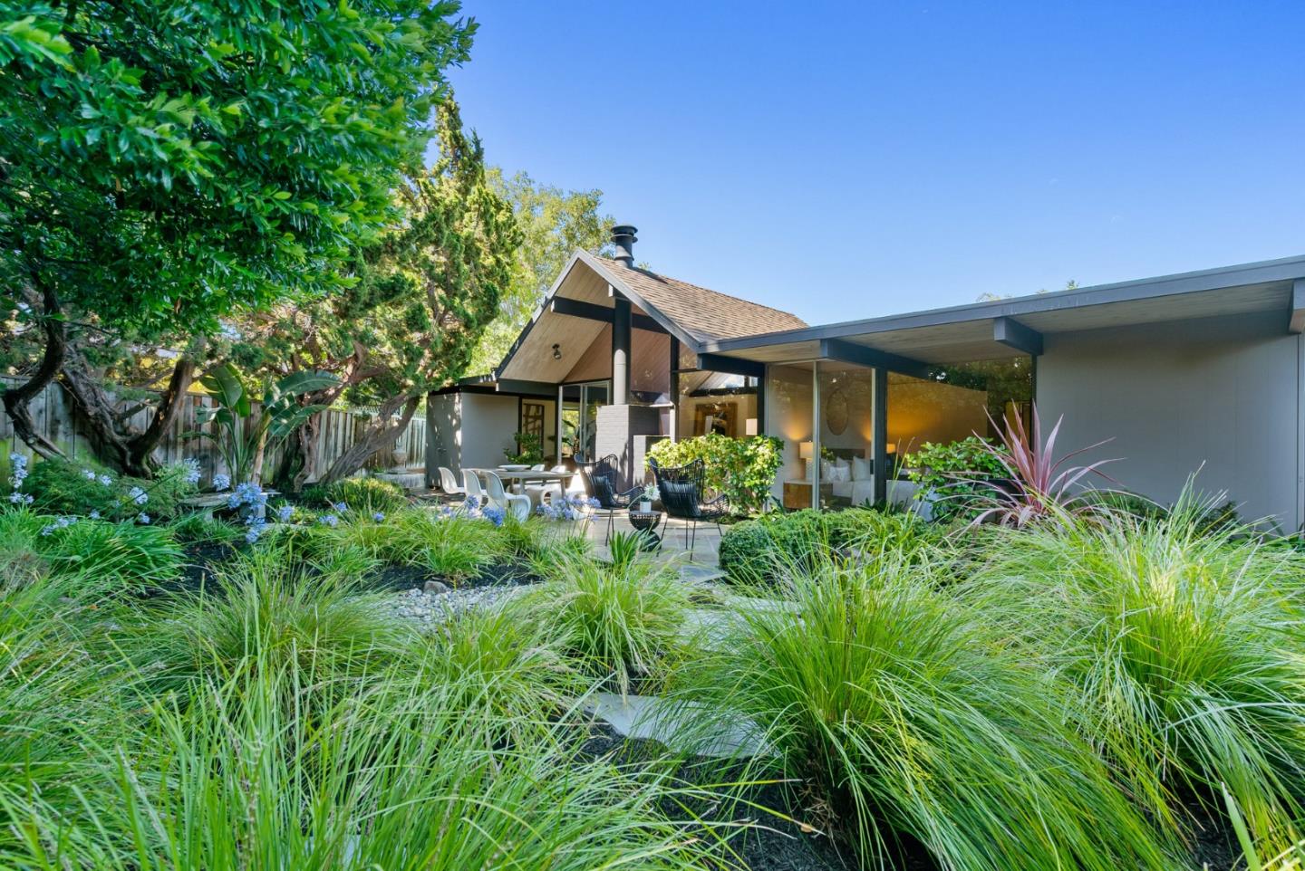 958 Eichler Drive Mountain View, CA 94040 - Photo 54 of 62 a front view of a house with a yard