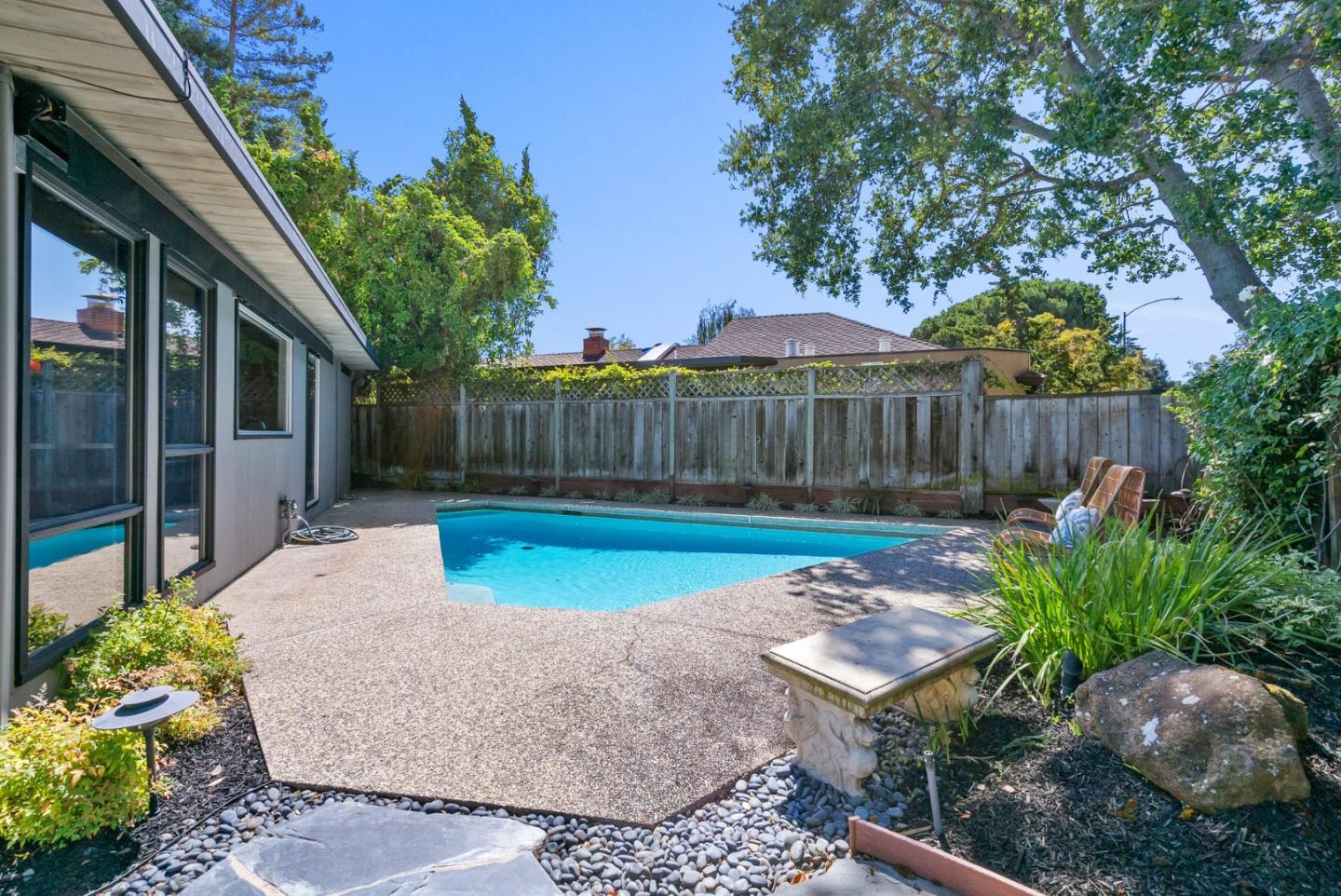 958 Eichler Drive Mountain View, CA 94040 - Photo 61 of 62 a view of a backyard with a garden