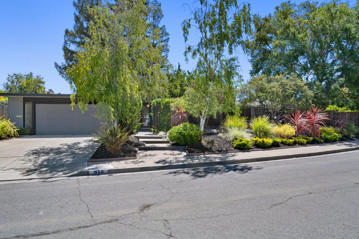 958 Eichler Drive Mountain View, CA 94040 - Photo 8 of 62 a view of a house with a street