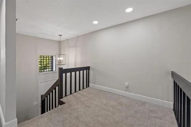 a view of hallway with a window