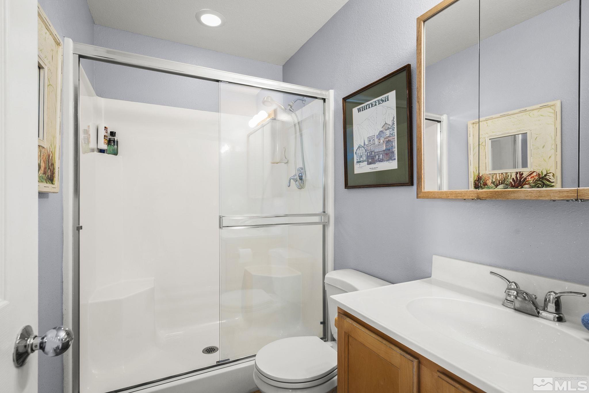 3160 Knight Road Reno, NV 89509 - Photo 14 of 39 a bathroom with a sink toilet and shower