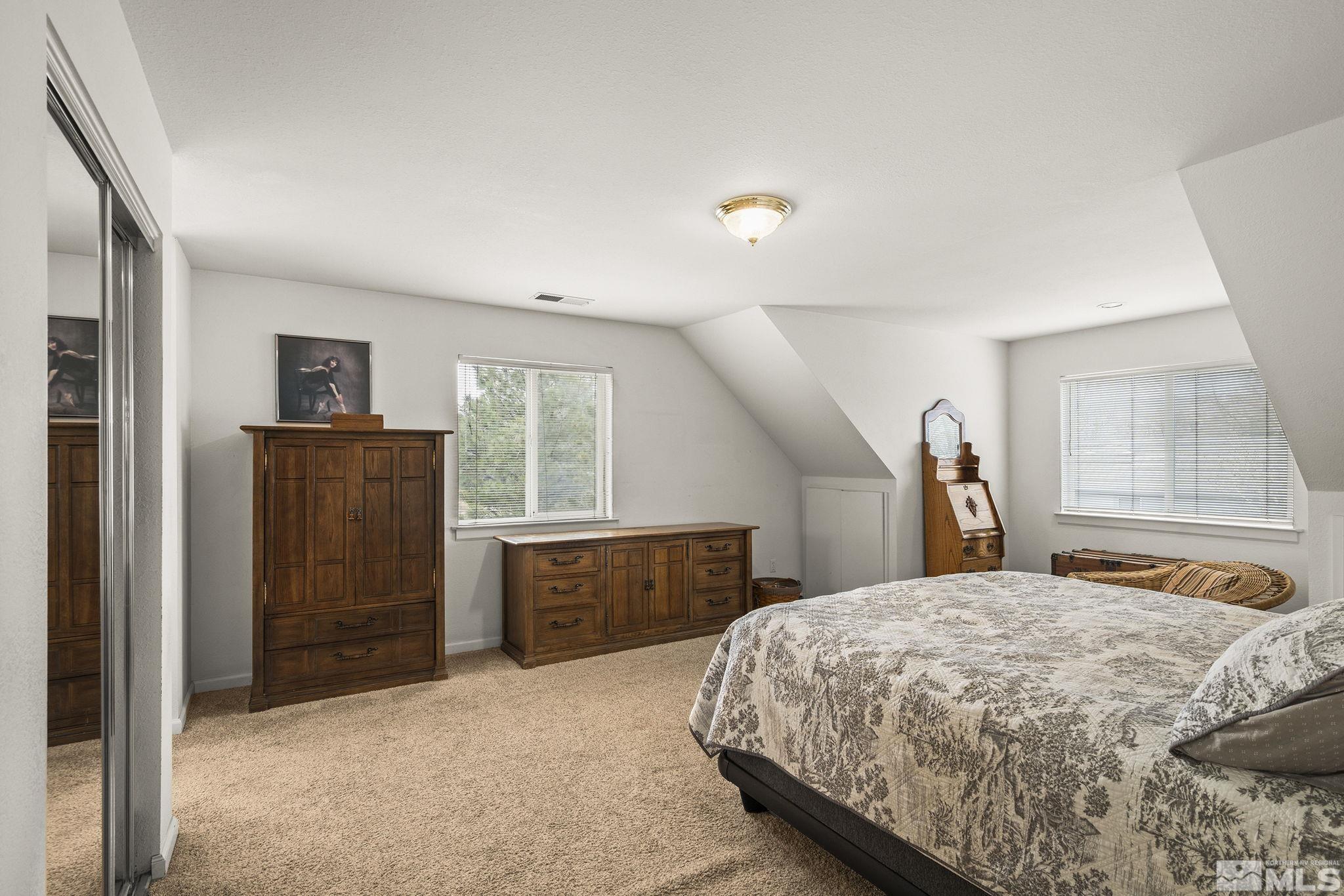3160 Knight Road Reno, NV 89509 - Photo 15 of 39 a bedroom with a bed and furniture