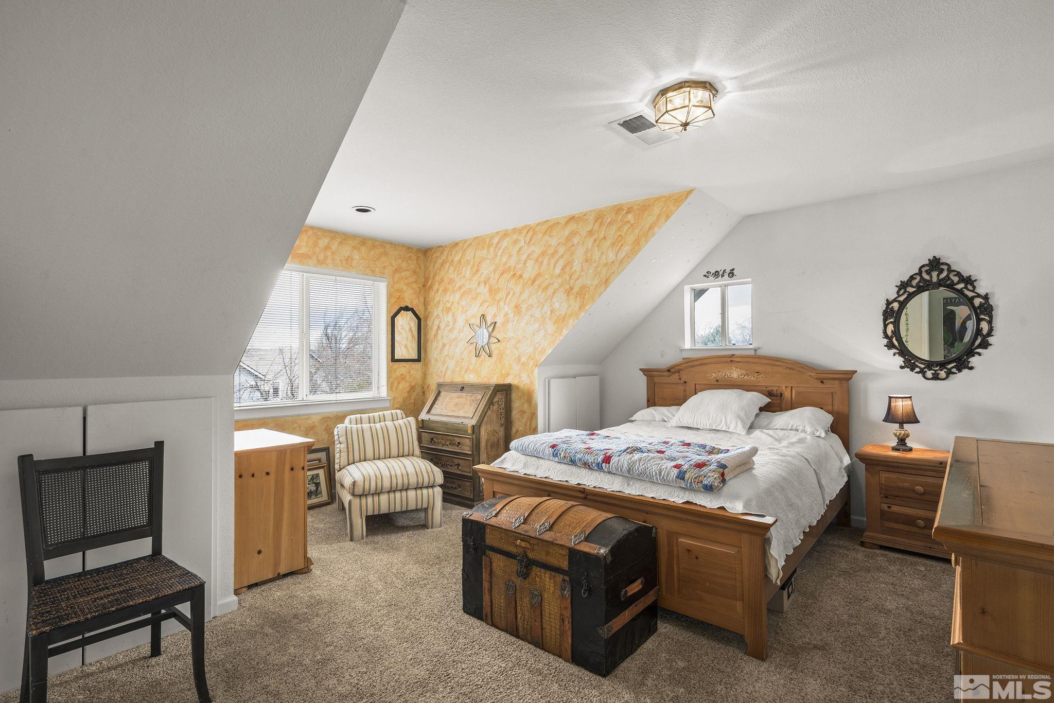 3160 Knight Road Reno, NV 89509 - Photo 19 of 39 a bedroom with a bed chair and window