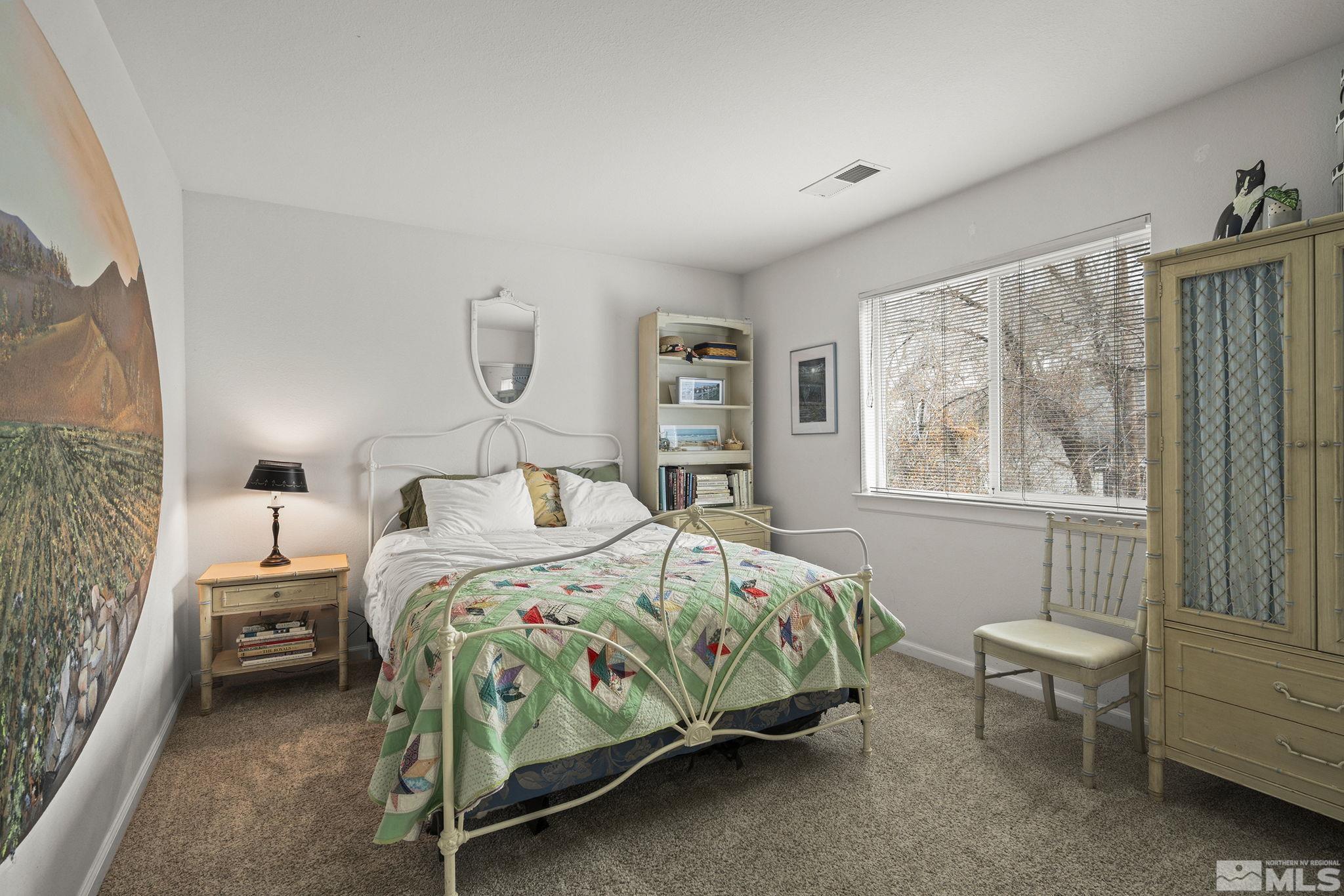 3160 Knight Road Reno, NV 89509 - Photo 20 of 39 a bedroom with a bed and a window