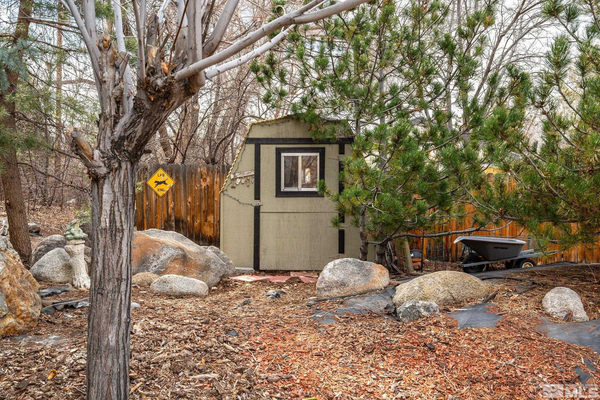 3160 Knight Road Reno, NV 89509 - Photo 28 of 39 a backyard of a house with table and chairs