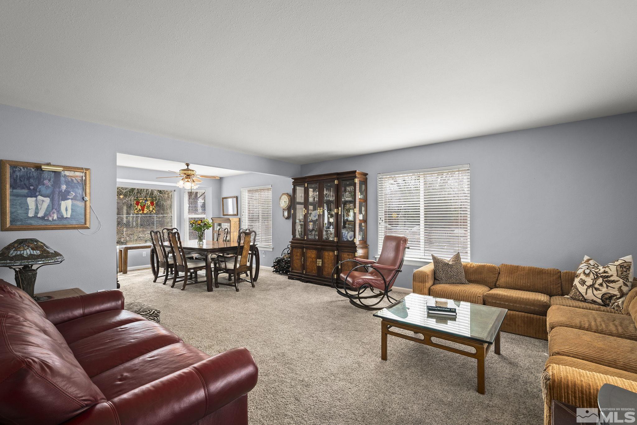 3160 Knight Road Reno, NV 89509 - Photo 5 of 39 a living room with furniture and a large window