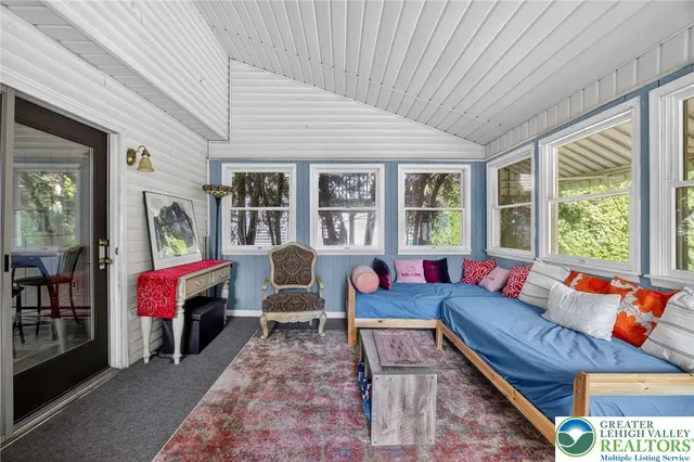 a living room with furniture and furniture