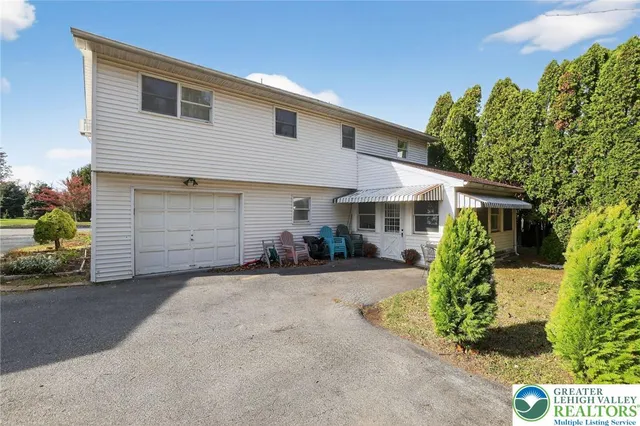 front view of a house with a patio