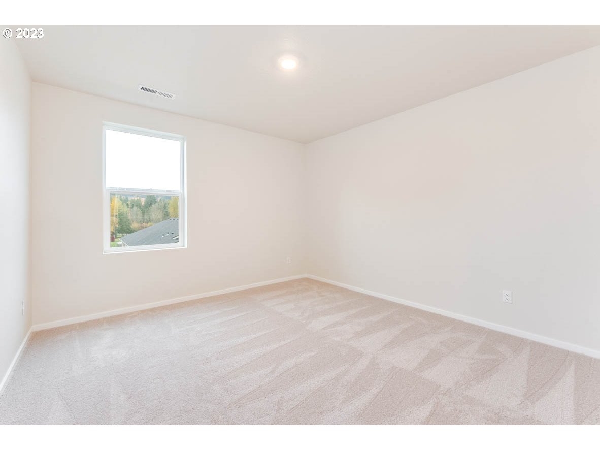 5629 Earth Street Northeast Dallas, OR 97338 - Photo 20 of 35 a view of an empty room with a window