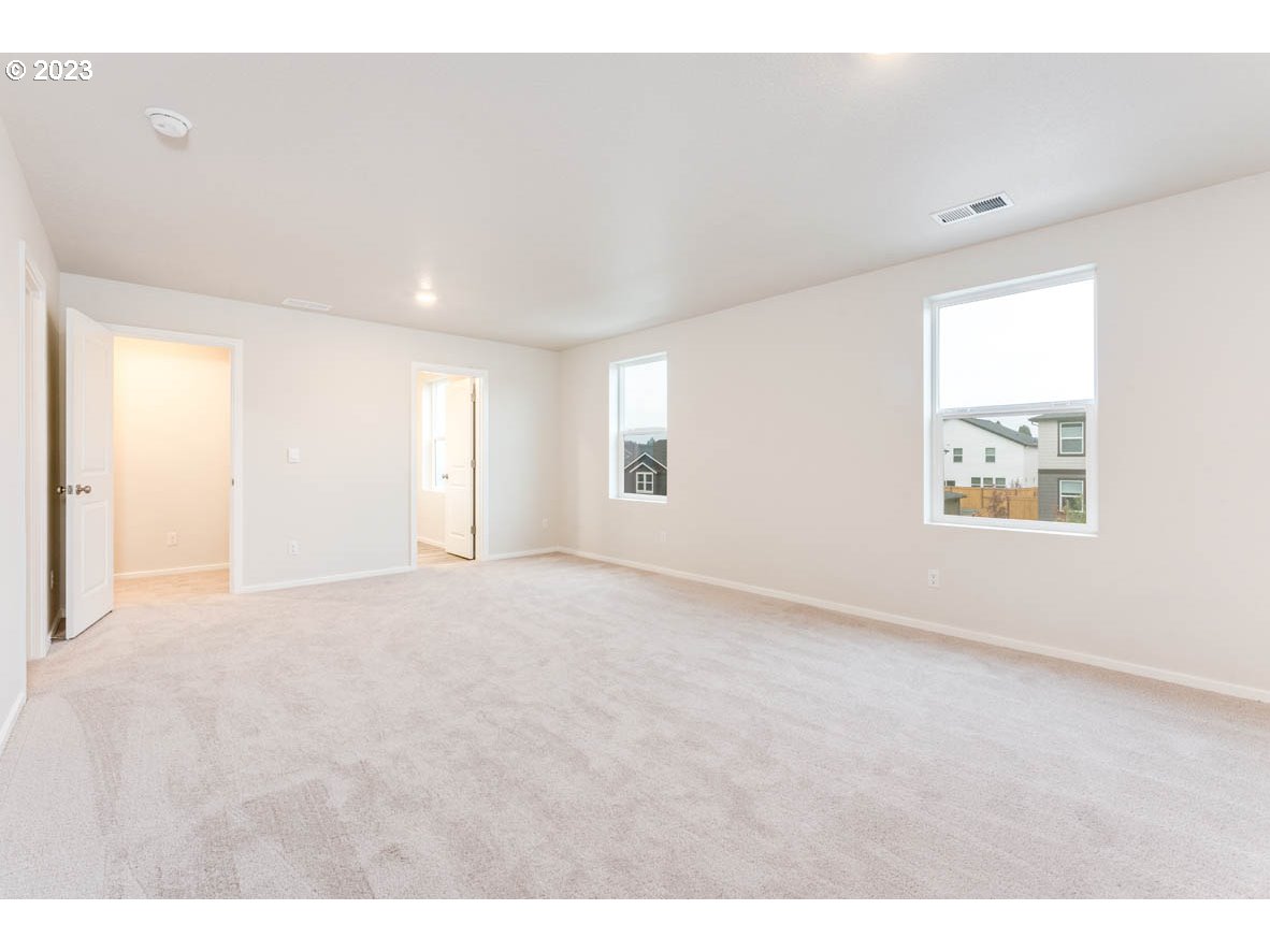 5629 Earth Street Northeast Dallas, OR 97338 - Photo 23 of 35 a view of an empty room with a window