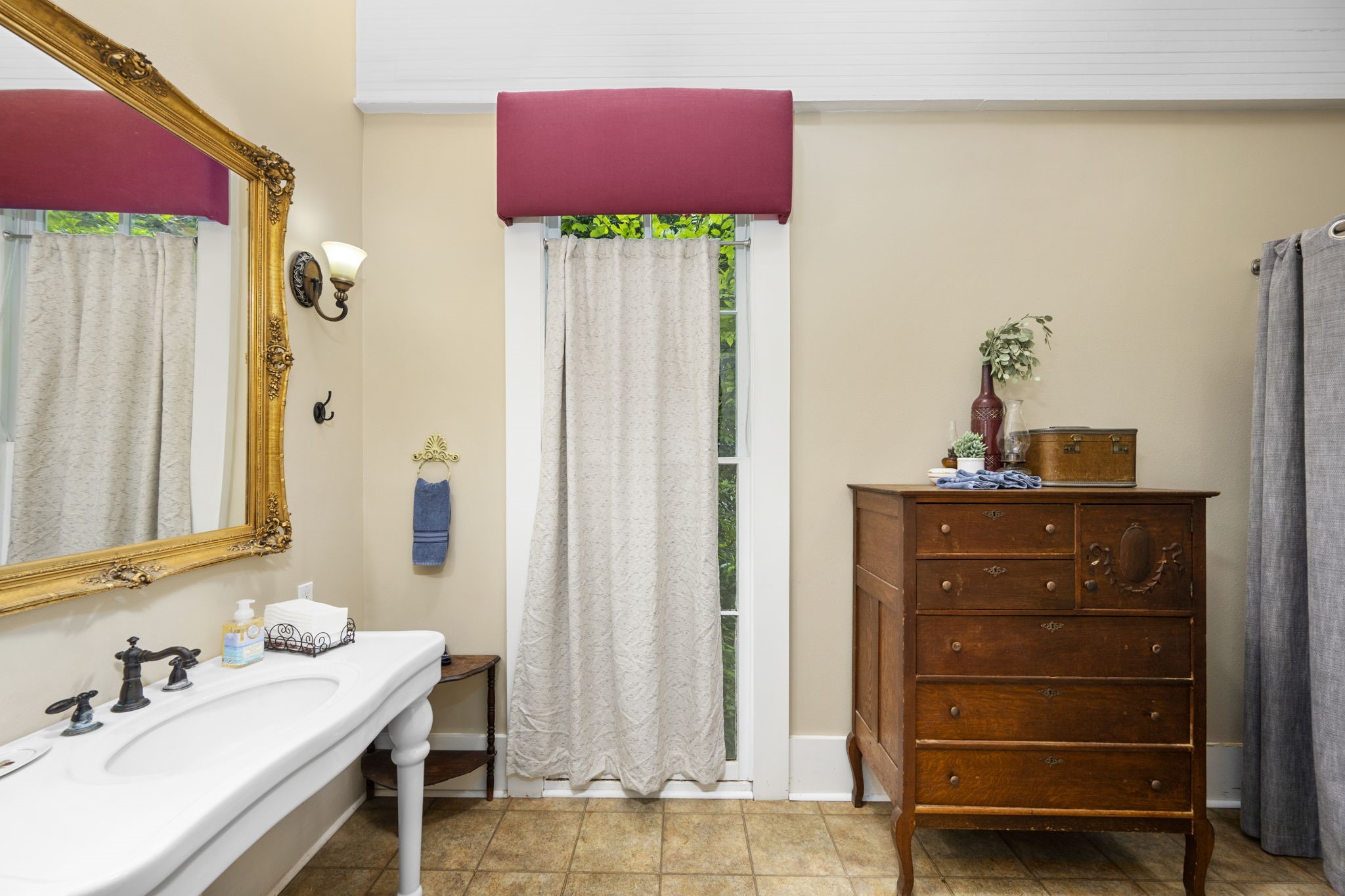 1118 Prairie Street Columbus, TX 78934 - Photo 20 of 34 a bathroom with a sink vanity and a mirror