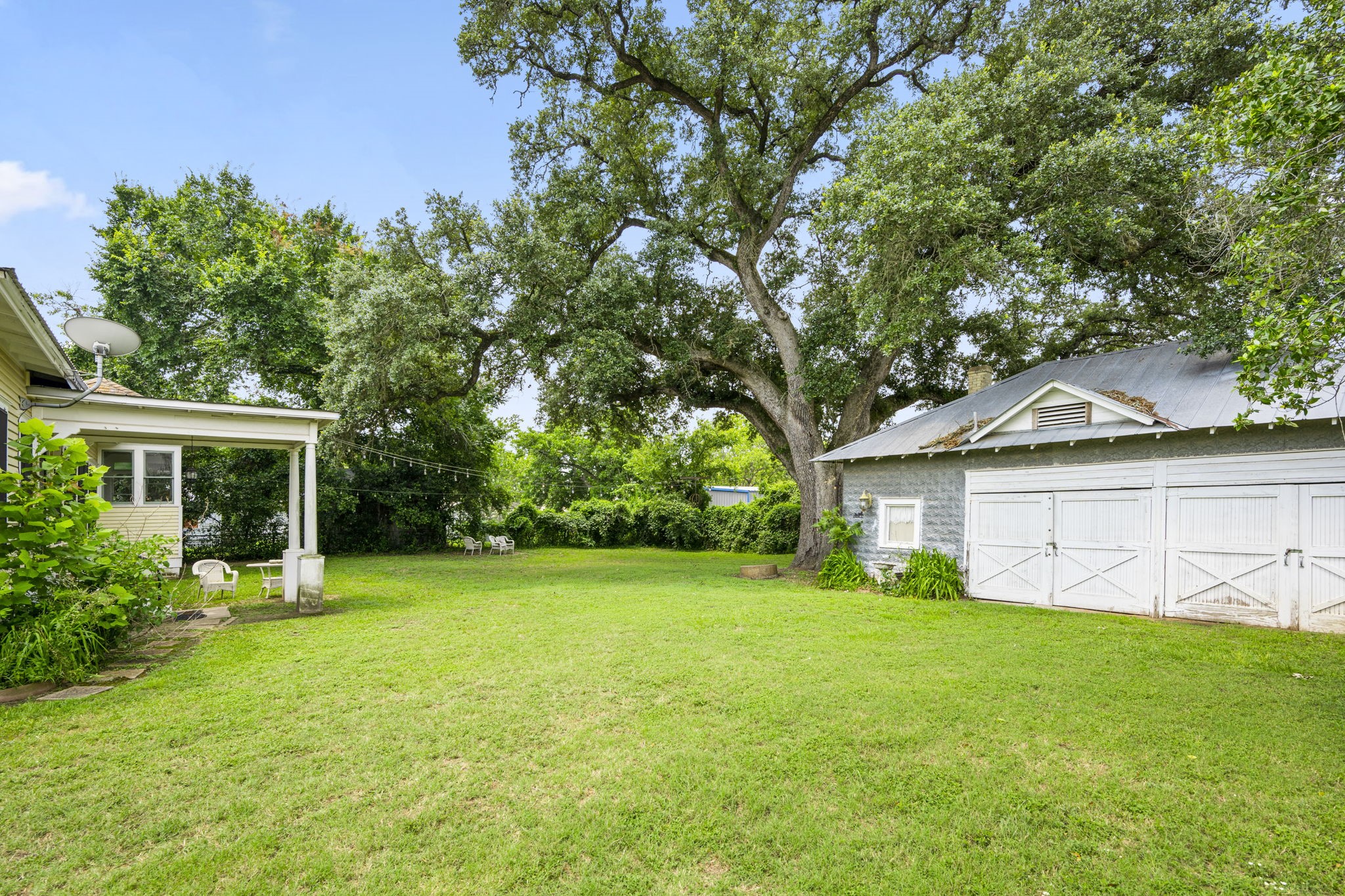1118 Prairie Street Columbus, TX 78934 - Photo 26 of 34 a view of a house with a yard and tree s