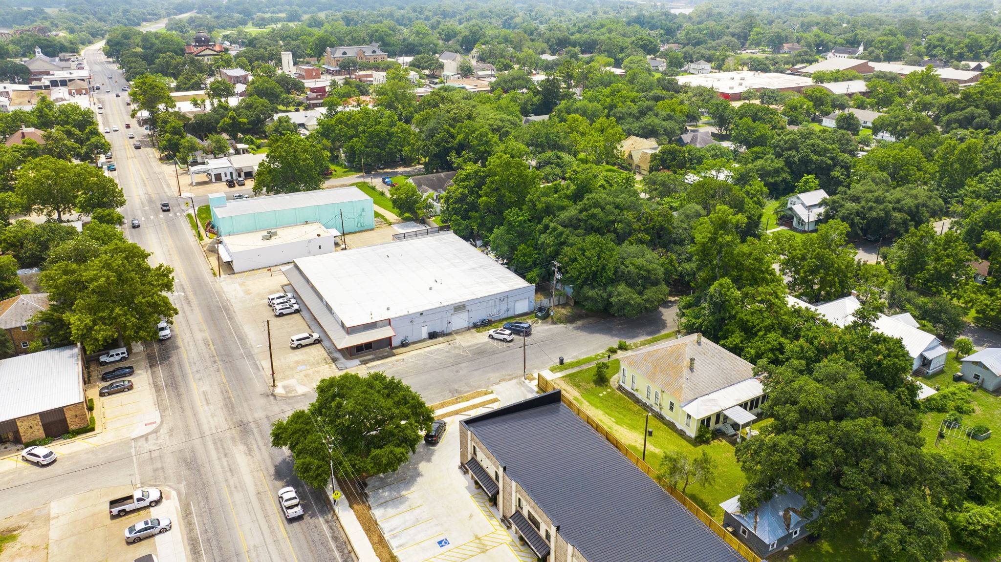 1118 Prairie Street Columbus, TX 78934 - Photo 33 of 34 an aerial view of a house with a yard basket ball court and outdoor seating