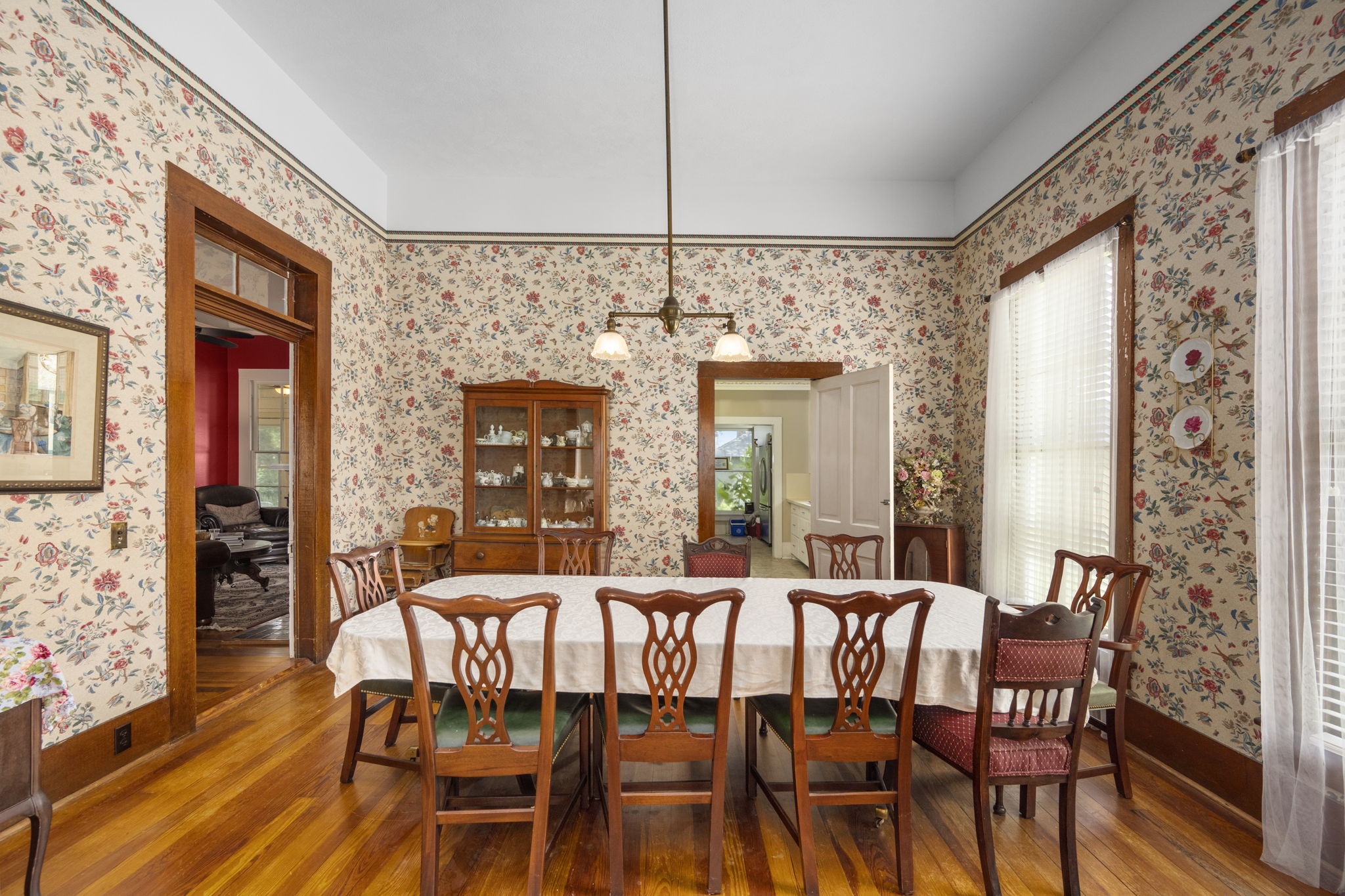 1118 Prairie Street Columbus, TX 78934 - Photo 10 of 34 a view of a dining room with furniture window and wooden floor