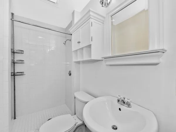 a bathroom with a sink and a toilet