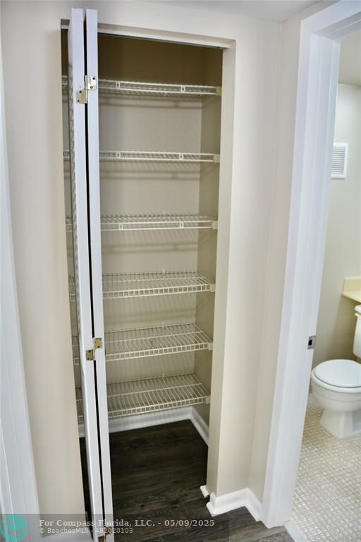 4070 Exeter Boca Raton, FL 33434 - Photo 12 of 59 a bathroom with a toilet and a shower