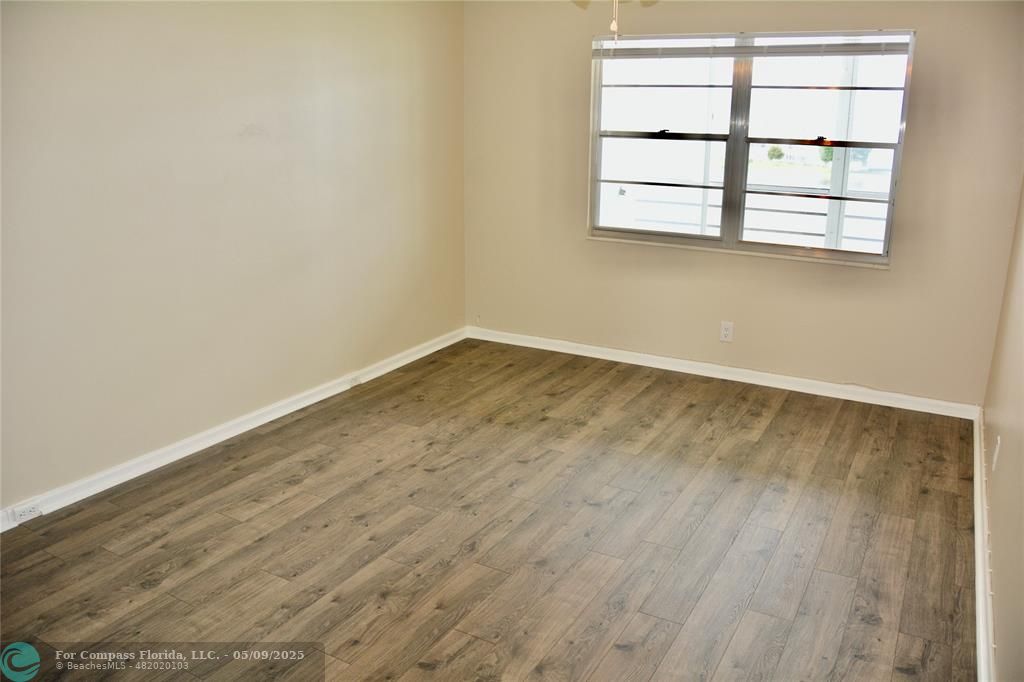 4070 Exeter Boca Raton, FL 33434 - Photo 16 of 59 an empty room with a window