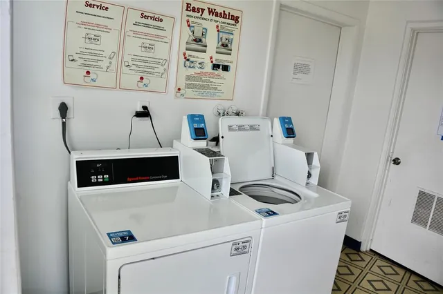 an empty room with wooden floor