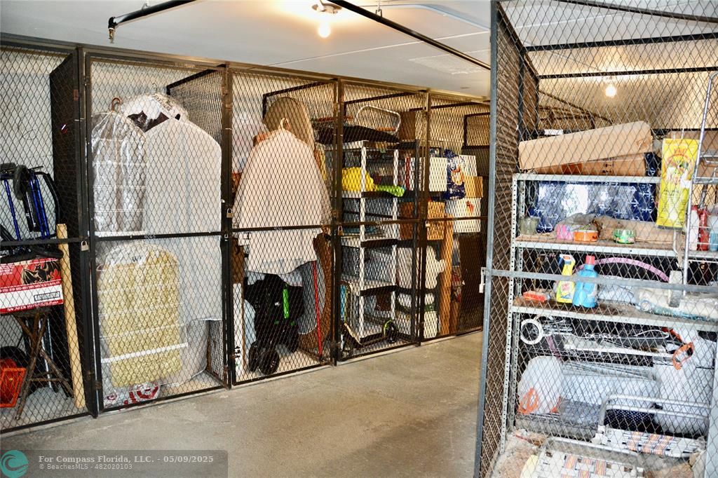 4070 Exeter Boca Raton, FL 33434 - Photo 21 of 59 a view of walk in closet with clothes and shoes