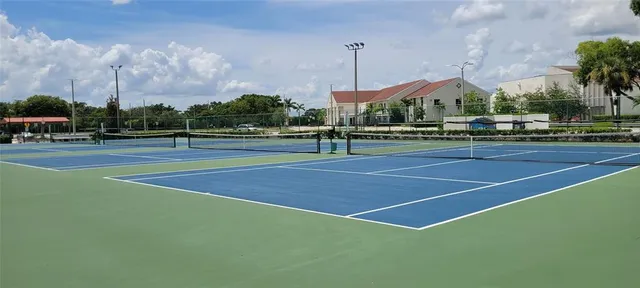 a view of an chairs and tables in the balcony