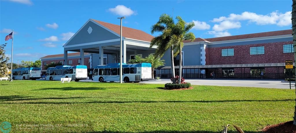 4070 Exeter Boca Raton, FL 33434 - Photo 32 of 59 a view of a house with a swimming pool