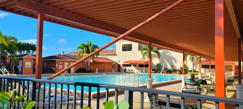 4070 Exeter Boca Raton, FL 33434 - Photo 33 of 59 a view of an chairs and tables in the balcony