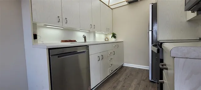 a bathroom with a toilet and a sink