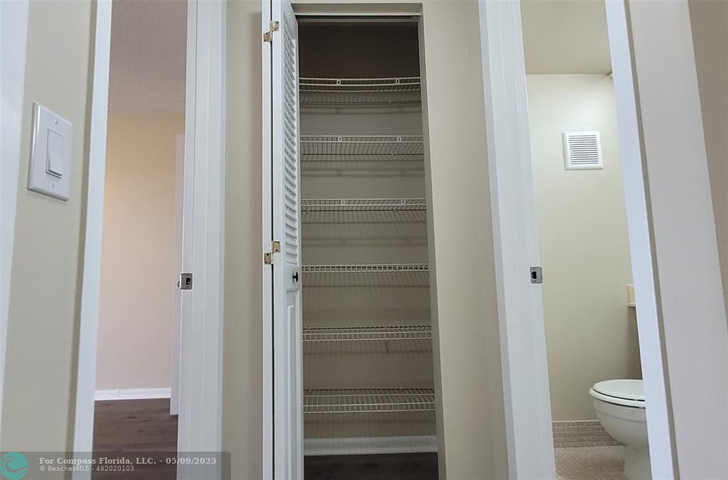 4070 Exeter Boca Raton, FL 33434 - Photo 49 of 59 a bathroom with a toilet and a sink