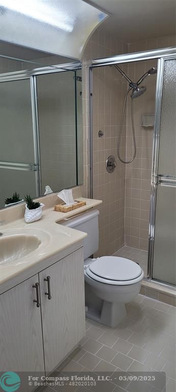 4070 Exeter Boca Raton, FL 33434 - Photo 50 of 59 a bathroom with a sink toilet and shower