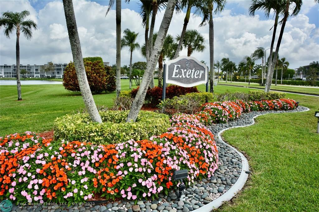 4070 Exeter Boca Raton, FL 33434 - Photo 59 of 59 a view of a sign board with flower around