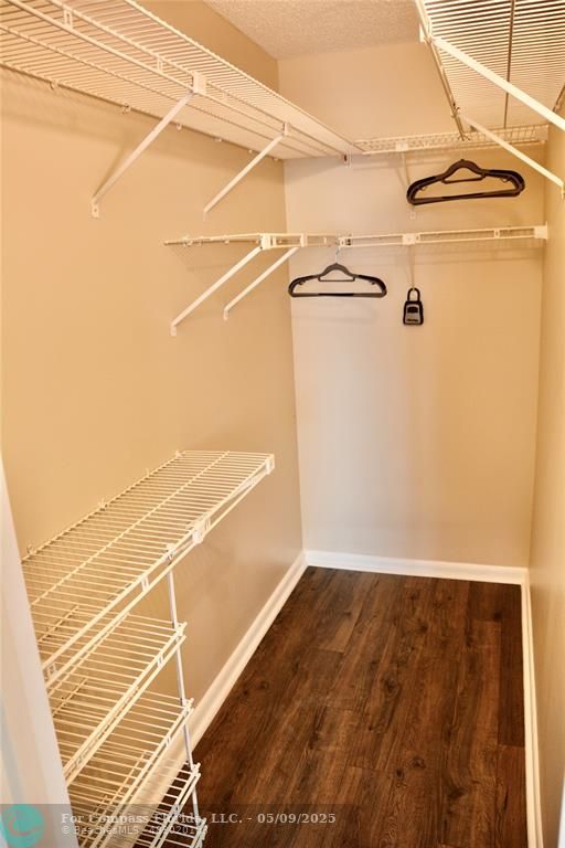 4070 Exeter Boca Raton, FL 33434 - Photo 9 of 59 a view of a room with empty space and wooden floor