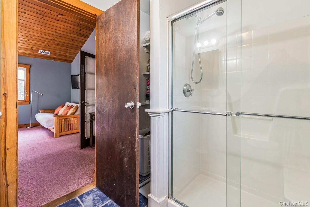 292 Little Fresh Pond Road Southampton, NY 11968 - Photo 27 of 46 En-Suite Primary Bathroom featuring walk in shower
