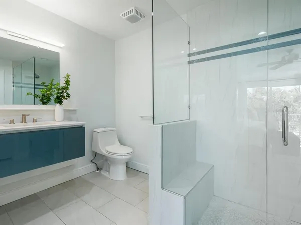 an aerial view of house with yard swimming pool and outdoor seating