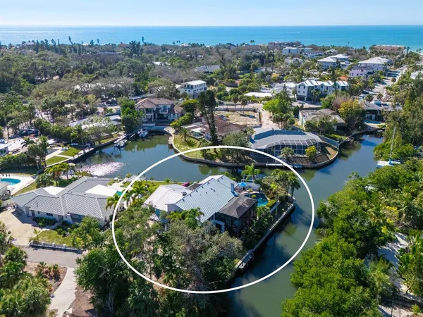 a view of outdoor space with signage and flags