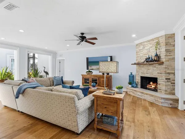 a kitchen with stainless steel appliances kitchen island granite countertop a sink and cabinets
