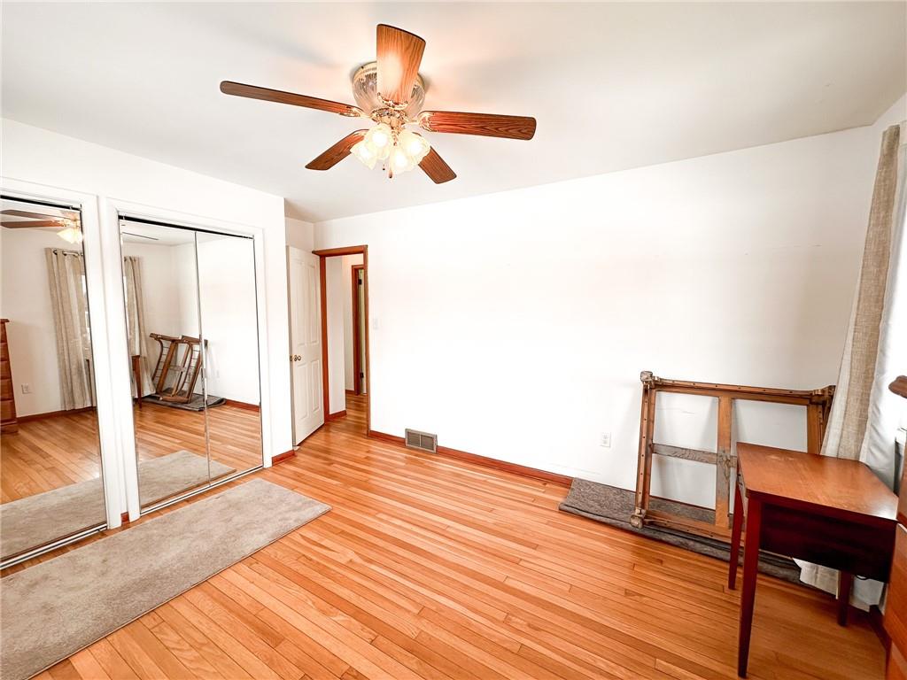 112 Reed Drive Industry, PA 15052 - Photo 11 of 38 a view of empty room with wooden floor