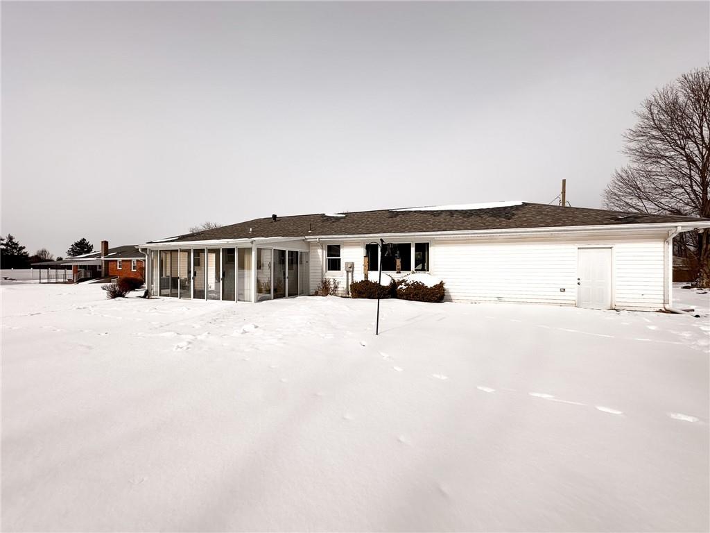 112 Reed Drive Industry, PA 15052 - Photo 37 of 38 a view of house with snow on the road