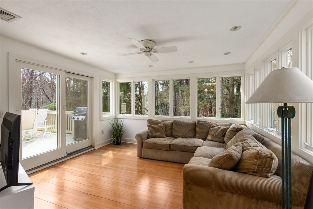 39 Dakin Road Sudbury, MA 01776 - Photo 11 of 34 a living room with furniture and a large window