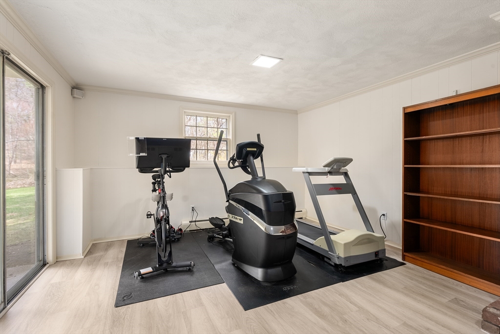 39 Dakin Road Sudbury, MA 01776 - Photo 24 of 34 a view of a room with gym equipment