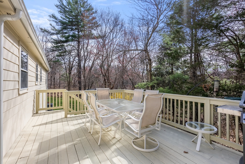 39 Dakin Road Sudbury, MA 01776 - Photo 28 of 34 a view of balcony with wooden floor and outdoor seating
