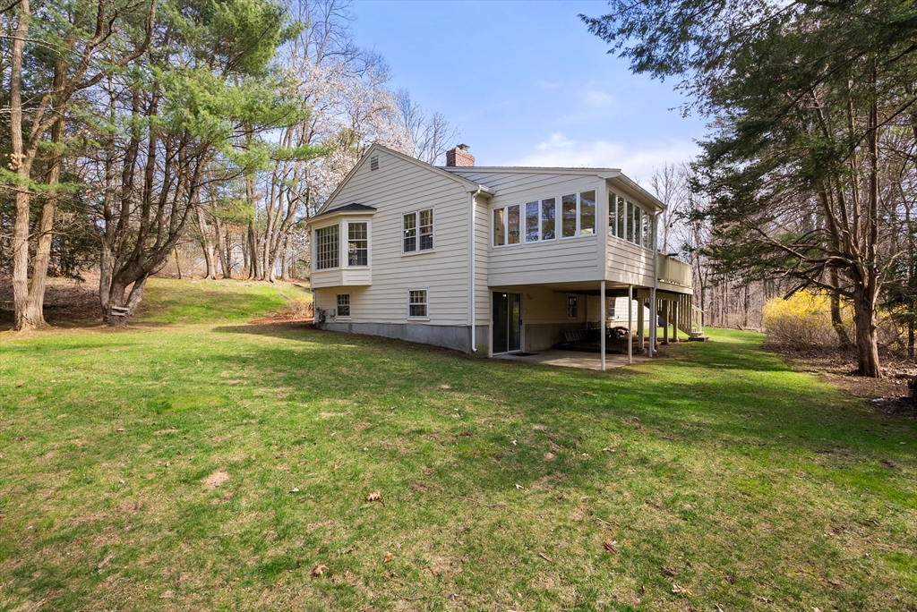 39 Dakin Road Sudbury, MA 01776 - Photo 30 of 34 a view of a house with a yard