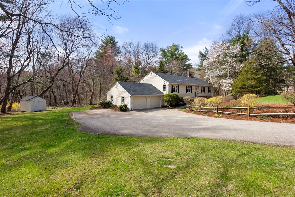39 Dakin Road Sudbury, MA 01776 - Photo 34 of 34 a front view of house with yard and green space