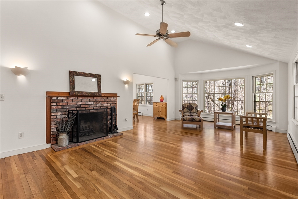 39 Dakin Road Sudbury, MA 01776 - Photo 4 of 34 a living room with furniture and a fireplace