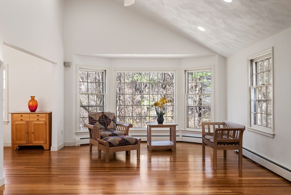 39 Dakin Road Sudbury, MA 01776 - Photo 6 of 34 a living room with furniture and a large window