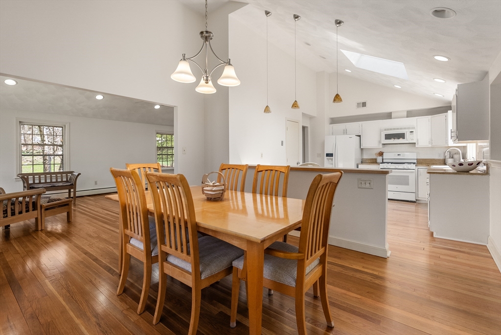 39 Dakin Road Sudbury, MA 01776 - Photo 8 of 34 a view of a dining room with furniture and wooden floor