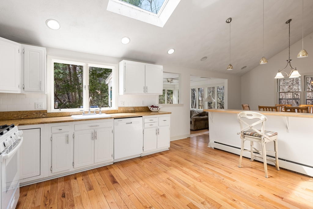 39 Dakin Road Sudbury, MA 01776 - Photo 10 of 34 a large white kitchen with a large window