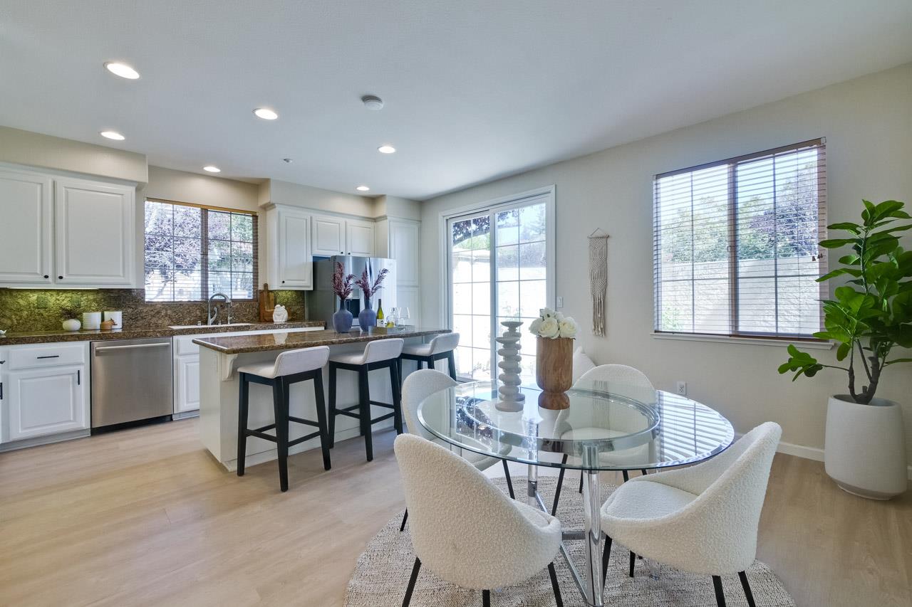 35489 Monterra Circle Union City, CA 94587 - Photo 12 of 52 a kitchen with a dining table chairs and kitchen view